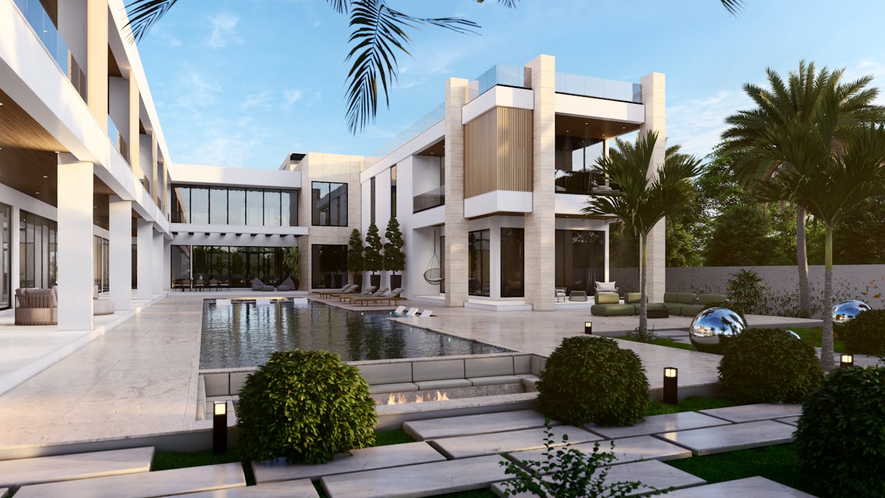 services-01 Elegant modern mansion featuring a luxurious pool surrounded by palm trees.